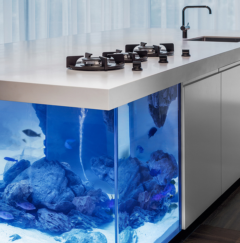 Illustration for article titled There's a Miniature Ocean Trapped Inside This Kitchen Island
